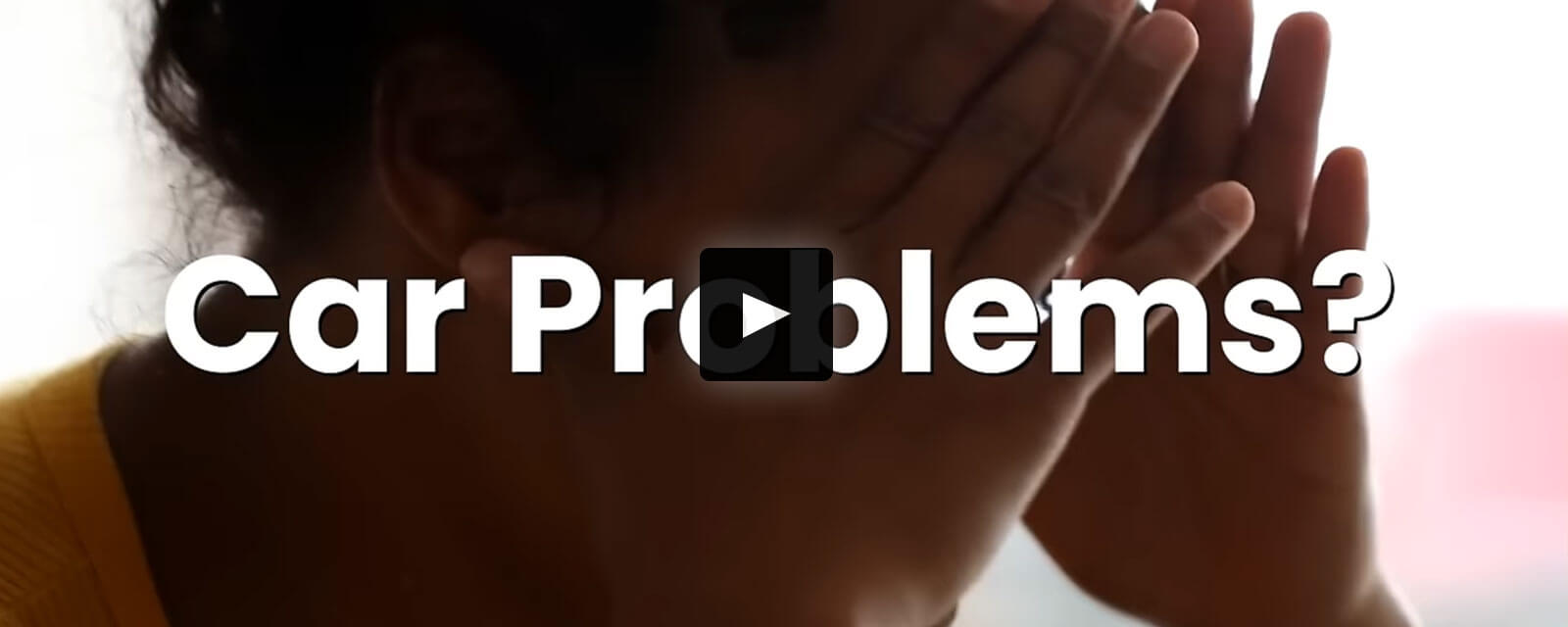 California mother stands outside dealership after Lemon Law battle